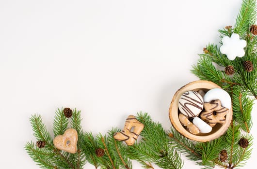 Nurnberg elisen gingerbread mix, traditional german christmas sweets with fir branches and pine cones, holiday background with copy space