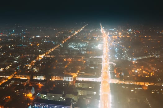 Gomel, Belarus. Main Street In Night Illumination. Sovetskaya Street In Homel. Aerial Night View.