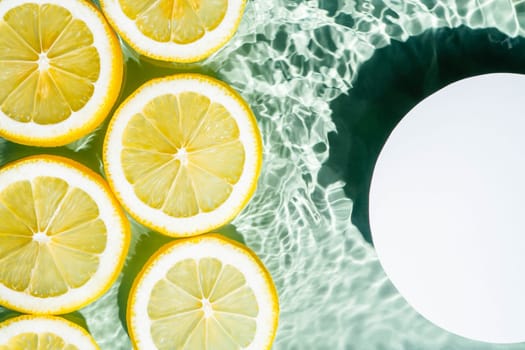 White circle copy space in transparent fresh exhilarant wave water with flecks background, lemon citrus slices. Summer freshness, healthy eating beach travel drinks concept. Flat lay, copy space