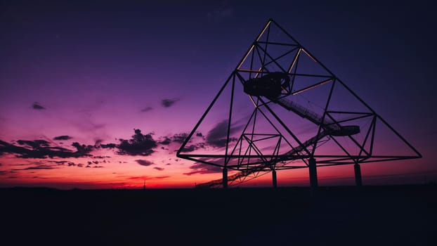 Viewing platform Tetraeder Bottrop in Bottrop, Germany at sunset.