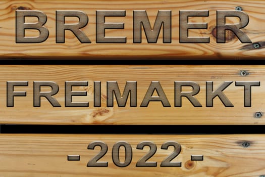 Three boards with an inscription in German. Translation Bremen free market.