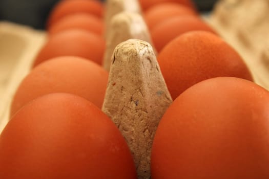 Chicken eggs in eco-friendly cardboard packaging close-up. Healthy food concept. Ecology concept.
