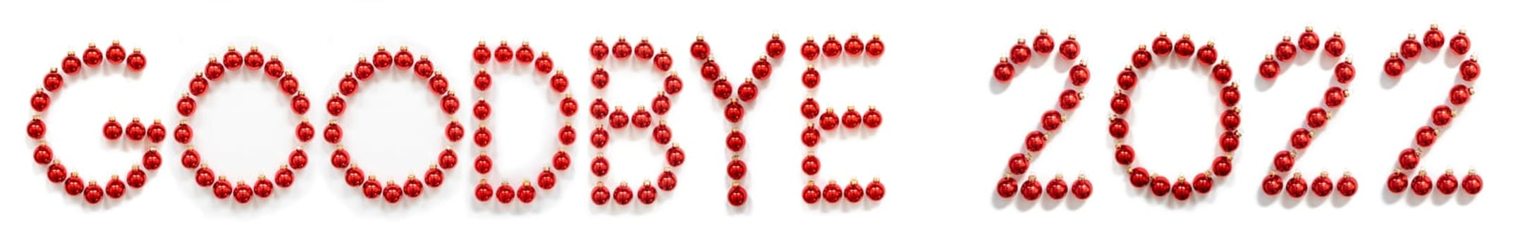 Red Christmas Ball Ornament Building English Word Goodbye 2022. Festive Christmas Decoration. White Isolated Background