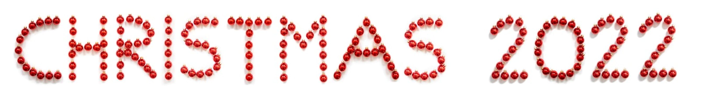 Red Christmas Ball Ornament Building English Word Christmas 2022. Festive Christmas Decoration. White Isolated Background