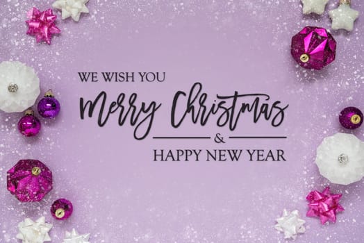 Christmas Card With English Text Merry Christmas And Happy New Year. Purple Christmas Background With Romantic And Brilliant Decoration Like Balls And Snowflakes