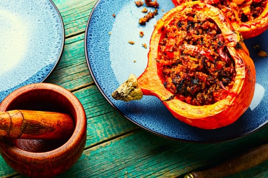 Baked pumpkin stuffed with vegetables, a popular autumn food.
