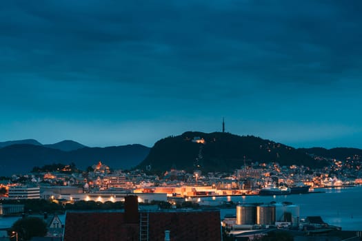 Alesund, Norway. Night Alesund Skyline Cityscape. Historical Center In Summer Evening. Famous Norwegian Landmark And Popular Destination. Alesund, Kiven viewpoint, Mt.