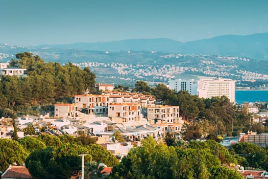 Kusadasi, Turkey. Beautiful Cityscape Of Turkish Town. White Residential Houses On Hillside. Real Estate Suburb In Summer Evening.