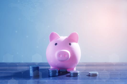 Save money and account banking for finance concept, Piggy bank with coin on blurred background, Save Monney for Investors Using Internet to Trade Stocks or Trade Fund