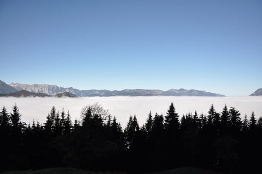 Mountains in Berchtesgadener Land, Alps in Bavaria, submerged in clouds