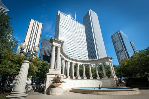 October 09, 2018, Millenium park, Chicago, Illinois, USA : famous entrance of the millenium park in the center of Chicago city with the skyline of downtown