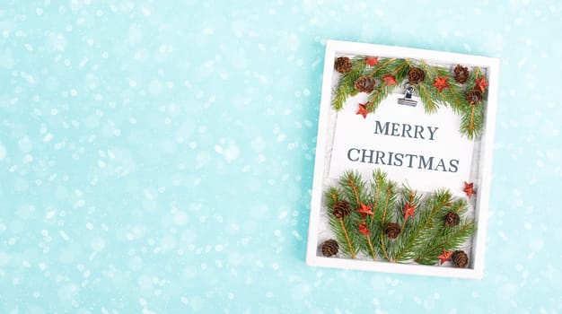 Christmas holiday background, frame with fir branches, stars, candy cane and pine cones, winter season greeting card
