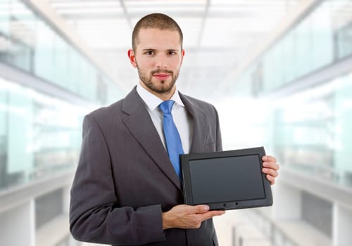 young businessman with a tablet pc, at the office