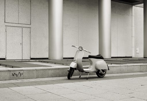 parked scooter on the roadside in the centre of Berlin