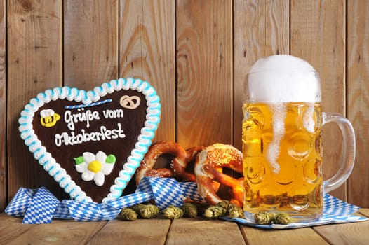 original Bavarian gingerbread heart with Oktoberfest beer mug and laugenbrezen