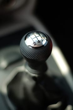 Photo of gear stick of modern sportive car