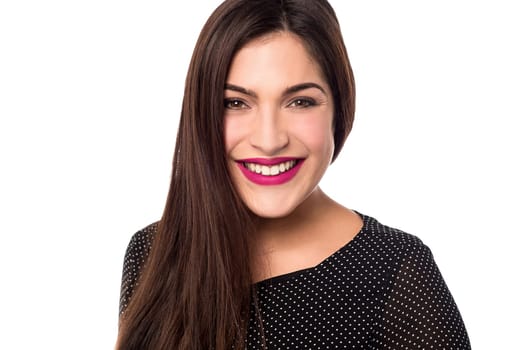 Young smiling woman posing to camera