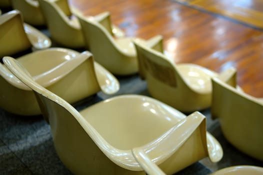 Close up view of line of chairs in stadium