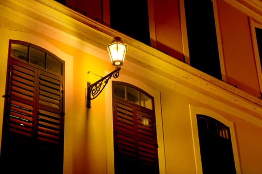Lantern (street lamp) hanging on the (exterior) wall of residential house
