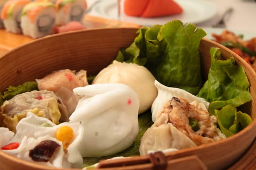 wontons in wooden bowl