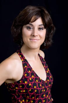 young beautiful brunette portrait against black background