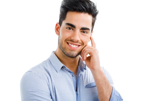 Portrait of happy handsome young man looking through his hands