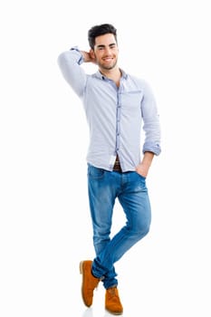 Portrait of happy handsome young man looking through his hands