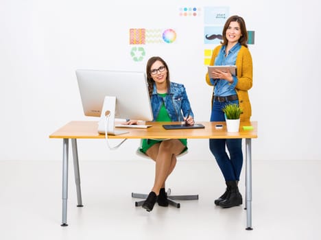 Women working at desk In a creative office, team work