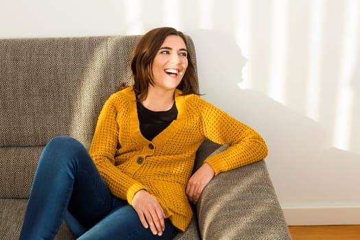 Beautiful woman enjoying the day at home