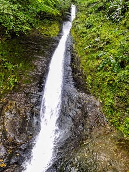 Whitelady waterfall in rain - Lydford Gorge, Dartmoor National Park, Devon, United Kingdom