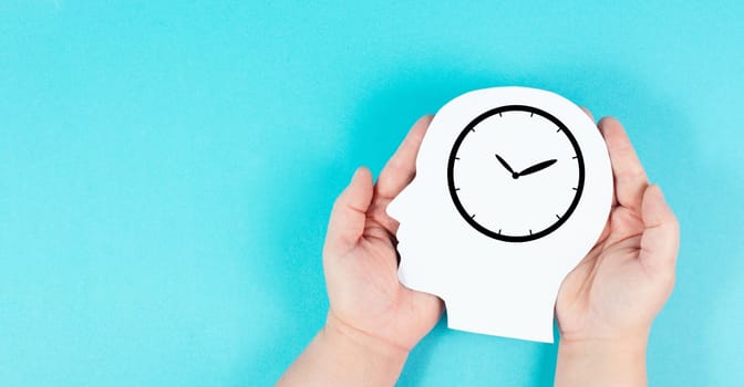 Silhouette of a head with a clock, time pressure and management in business, having a deadline or appointment, efficiency planning