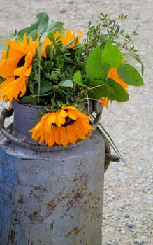 A festive decoration with beautiful yellow sunflowers.