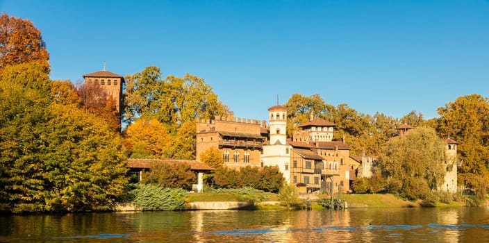 Turin, Italy - Circa November 2021: outdoors panorama with scenic Turin Valentino castle at sunrise in autumn