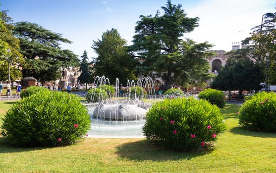 Verona, Italy - June 2022: the Fountain of Alps, located in Piazza Bra garden