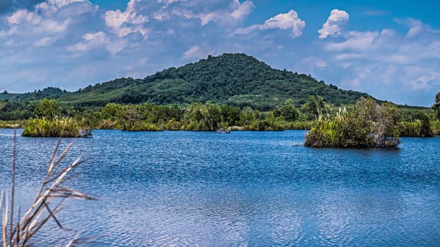 Panorama of summer landscape with clear mountain lake  and forest landscape Rayong Provincial East Plant Center Thailand