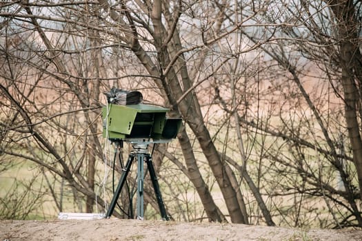 Mobile Road Police Radar On Tripod For Traffic Speed Control. Control Speed Limit. Speed Camera On Highway Road.