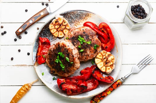 Grilled beef steak, beef and pork with spices. Grilled meat in bacon.