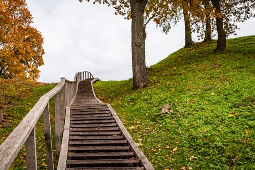 Steep wooden stairs to a hill near dubingiai, Lithuania.