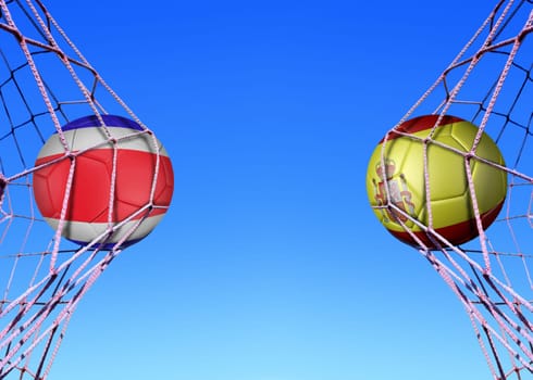 Two soccer balls in flags Costa rica and Spain, in a net