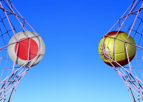 Two soccer balls in flags Japan and Spain, in a net