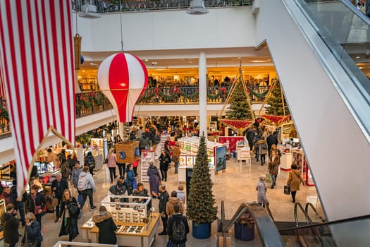 Dublin, November 2019 Crowd of people shopping for Christmas gifts. Christmas decorations in Arnotts Shopping centre on Henry Street