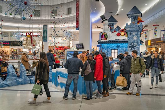 Dublin, November 2019 People, families queuing to visit Santa Claus grotto or castle in Jervis Shopping Centre