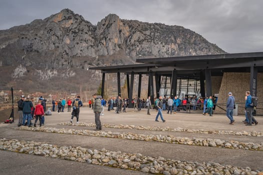 Tarascon sur Ariege, France, Jan 2020 People in a restaurant, stretching legs before hitting the road to reach their destination in Pyrenees mountains