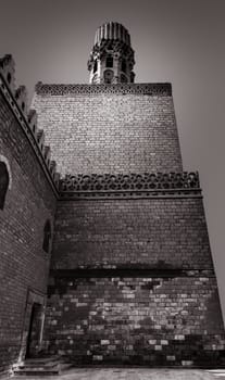 Minaret of Al Hakem mosque (The Enlightened Mosque) is a major Islamic religious site in Cairo, Egypt. named after Imam Al-Hakim bi-Amr Allah (985–1021), the sixth Fatimid caliph,16th Fatimid/Ismaili Imam and the first to be born in Egypt, located in Islamic Cairo, on the east side of Muizz Street, just south of Bab Al-Futuh. The mosque have two minarets that stood independent of the brick walls at the corners. These are the earliest surviving minarets in the city and they have been restored at various times