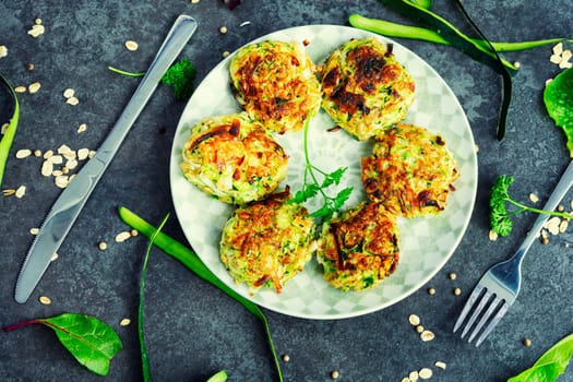 Vegan cutlets from zucchini, oatmeal and greens.
