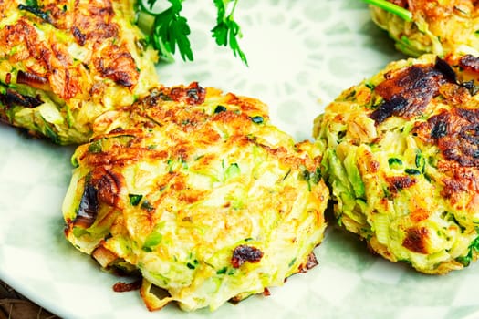 Vegan cutlets from zucchini, oatmeal and greens.