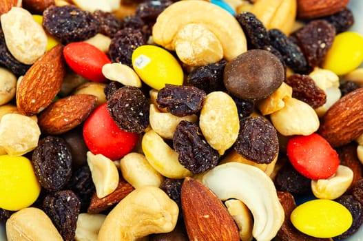 Set of nuts, almonds, cashews and raisins.