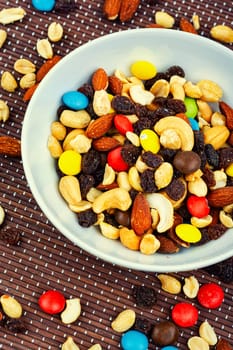 Set of nuts, almonds, cashews and raisins.