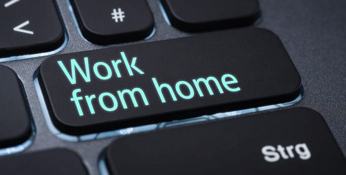 Illuminated keyboard with a labeled key - Work from home