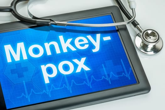 Tablet with the text Monkeypox on the display
